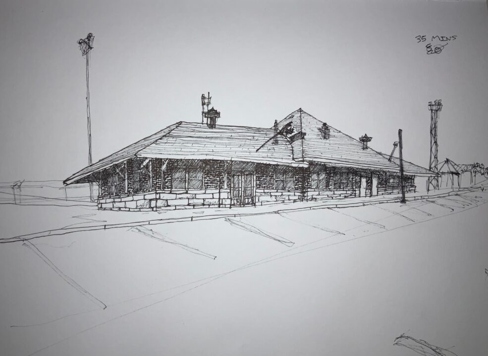 Hand drawn perspective ink drawing of a train station