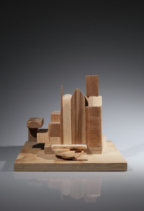 Photograph of a model made of solid wood blocks