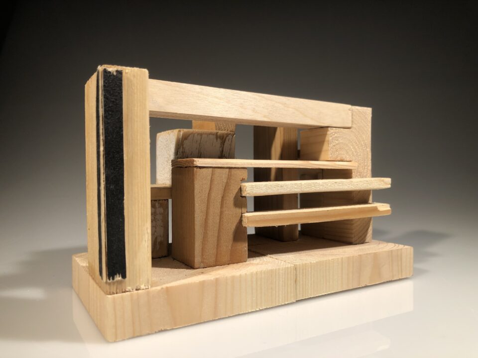 Photograph of a model made of solid wood blocks