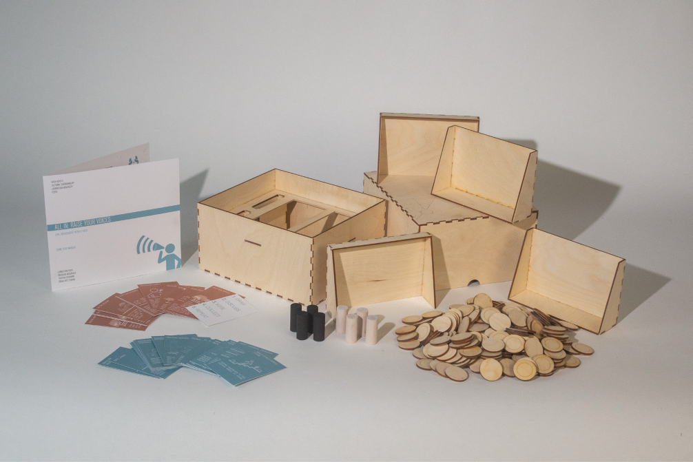 Photograph of a wooden board game and pieces designed by students