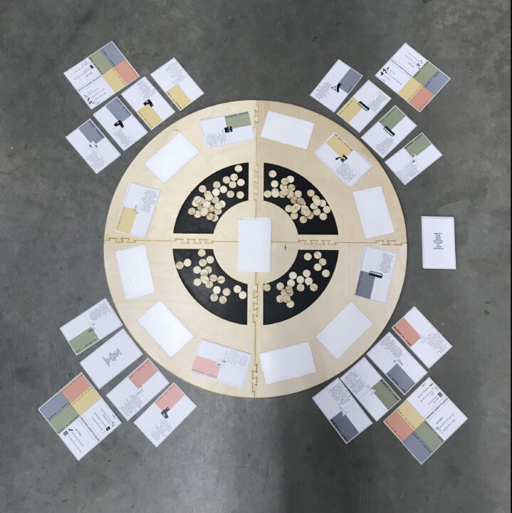 Photograph of a wooden circular board game designed by students